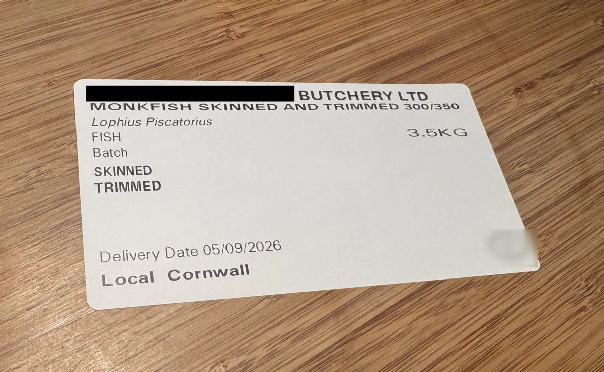 An Aquarius label for skinned and trimmed monkfish showing the scientific name, weight, batch and delivery date